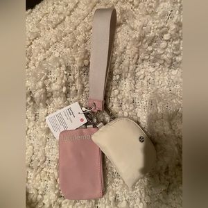 Lululemon dual pouch wristlet pink peony.